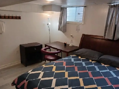 A brand new private day room with a queen-size bed Image# 2