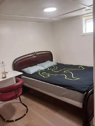 A brand new private day room with a queen-size bed Image# 6