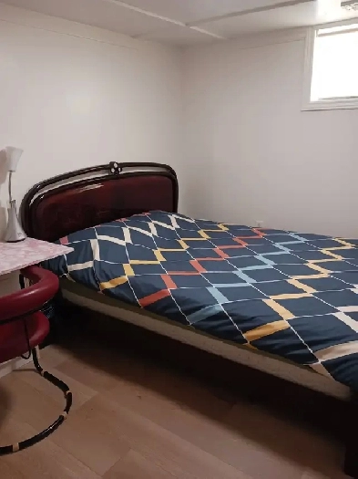 A brand new private day room with a queen-size bed Image# 6