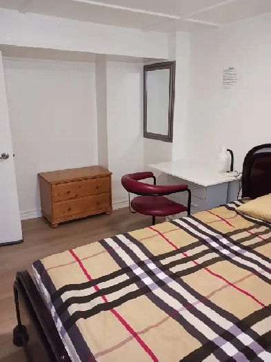 A brand new private day room with a queen-size bed Image# 2