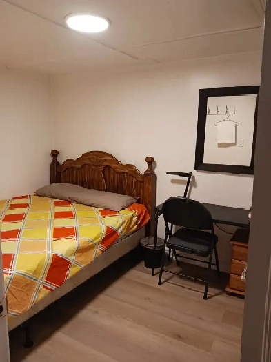 A brand new private day room with a queen-size bed Image# 3