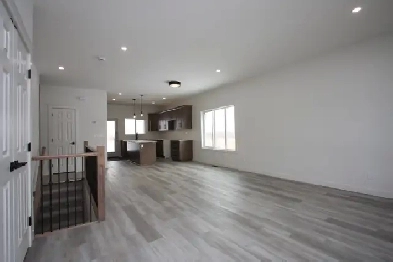 Custom Built Bungalow with Double Garage in Kingman, AB Image# 1