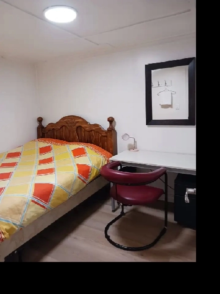 A brand new private day room with a queen-size bed Image# 1