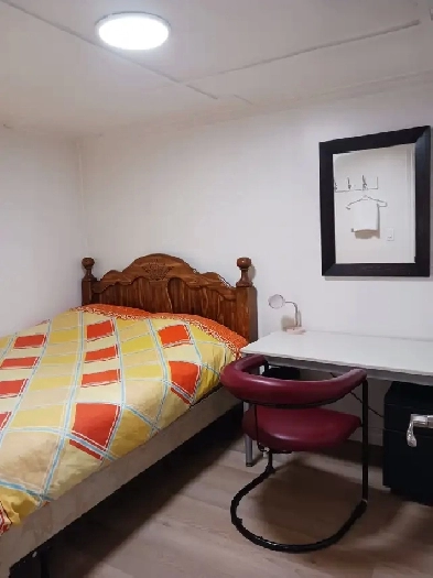 A brand new private day room with a queensize bed