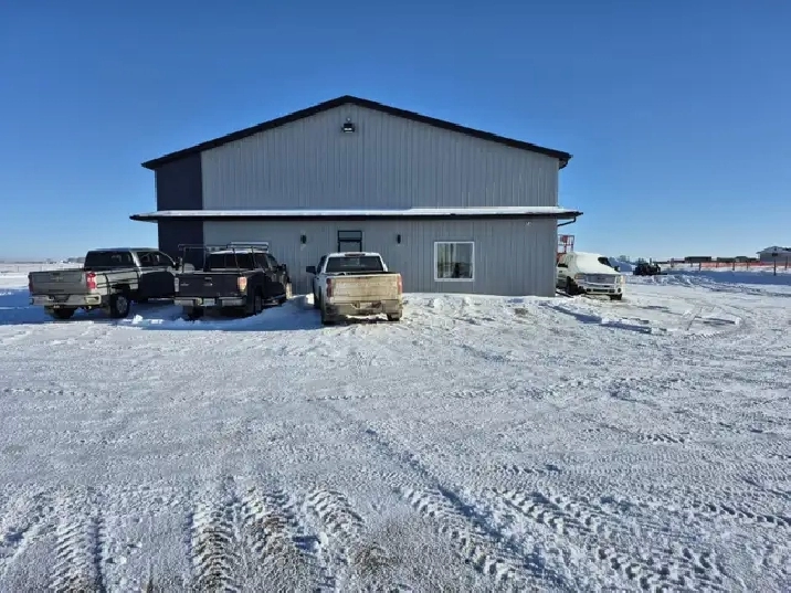 COMMERCIAL SHOP  AND 74 ACRES OF PASTURE FOR DEVELOPMENT