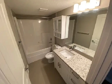 Auburn Bay 2BR Condo w/ Lake Access   Heated Underground Parking Image# 1