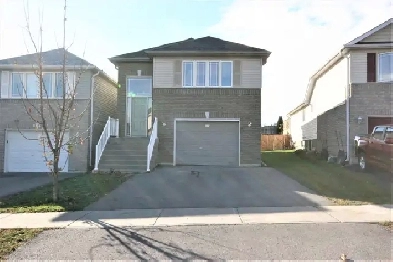 Multi-family 2 1 Single Family Home in Peterborough South Image# 1