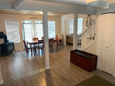 Fun, Cozy and Bright!   This 4-bedroom Lake Lot Acreage! Image# 1