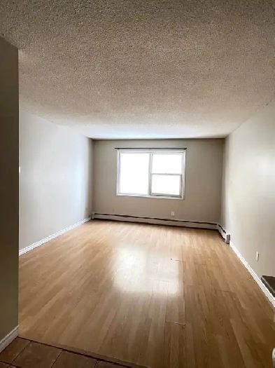 1 and 2 BD APARTMENTS for rent one block to NAIT Image# 3