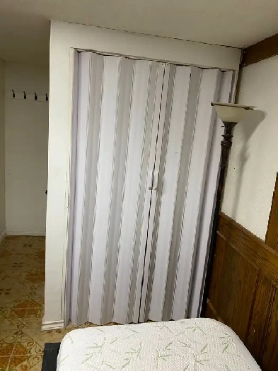 Private room is available for rent in a walkout basement. Image# 6