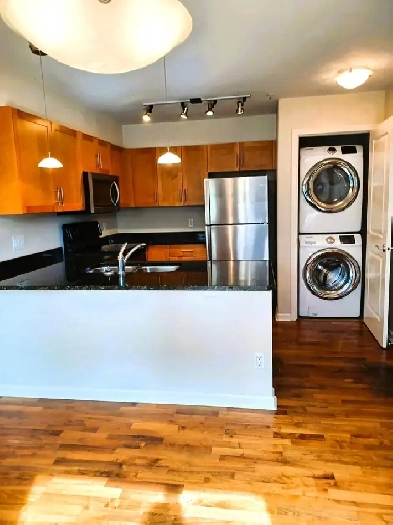 Bright & Sunny corner unit with private patio- Available now!