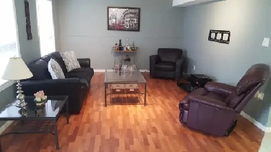 Bright walkout 2 bed 1 bath apartment in house private yard Image# 1