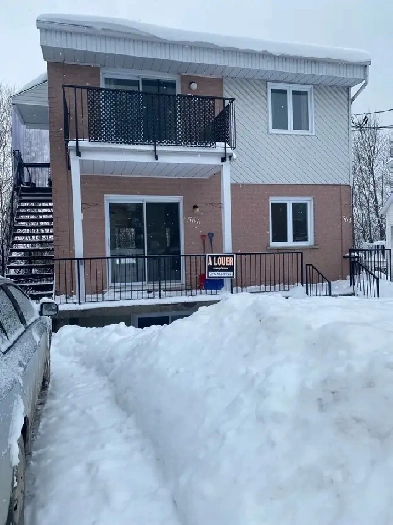 Spatieux 41/2 dans triplex 1235$ Image# 1