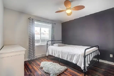 Superbe condo 4 1/2 au rez-de-chaussée, situé dans un secteur re Image# 1