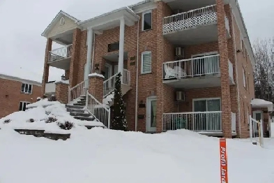 4 1/2 style condo-lumineux-1 er plancher,garage chauffé Image# 1