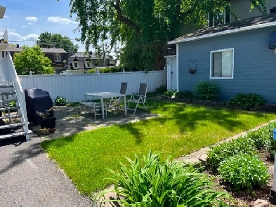 Grand 4 ½, électricité inclus, terrain privé, St-Hubert Image# 1