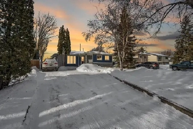 FOR SALE: Riverbend Bungalow Backing Onto Green Space Image# 4