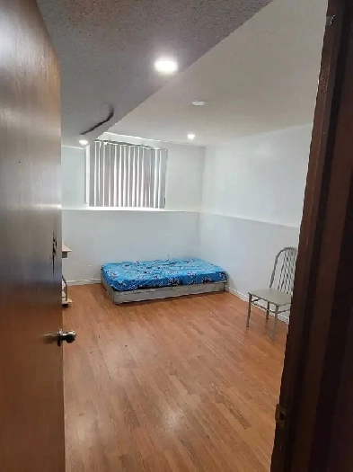 Basement room with a separate washroom Image# 1