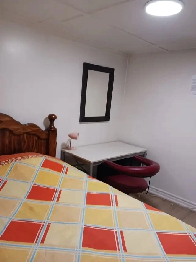 A brand new private day room with a queensize bed