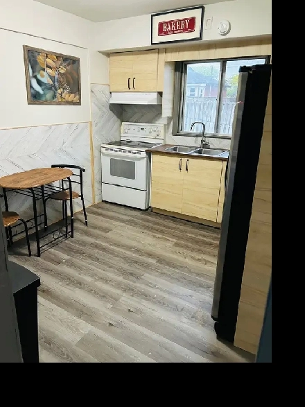 Modern 1-Bedroom Apartment with  Furnishings - Upper James Image# 1