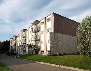 STUNNING 2 Bedroom with Scenic Balcony - Near Fairview Mall Image# 1
