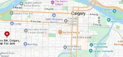 Downtown an Aboveground uncovered parking stall For Rent