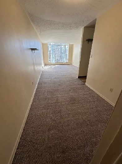 Large All Inclusive 1 Bdrm   Den Available April 1st Image# 1