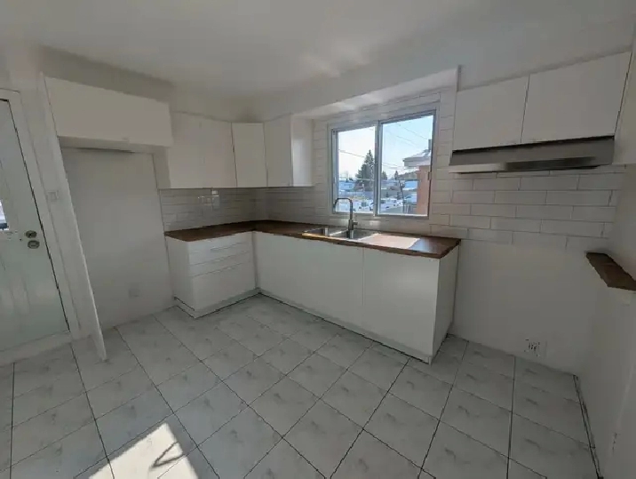 4½ Rénové Ste-Thérèse | 2e étage | Stationnement x2 | Disponible