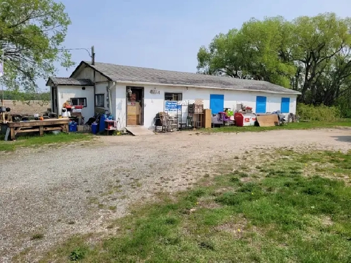 Residential land on highway #1 for sale has 2 buildings on it