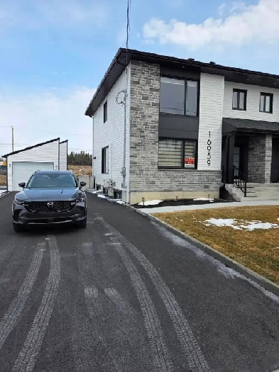 Maison jumelée de type Cottage