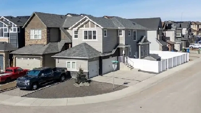 Triple Garage   RV Parking and Basement Suite!