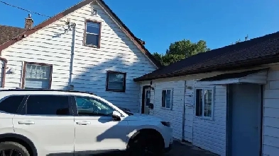 Office and parking lot for Used car dealership.