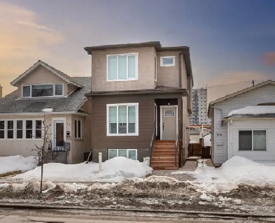Custom-Built Owner-Occupied Duplex in St. Boniface! Seperate Utl