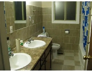 Room for rent in quiet triplex. Close to bus route, plaza