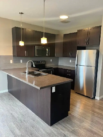 3 bed/2 bath end unit townhouse for rent in Penhold!