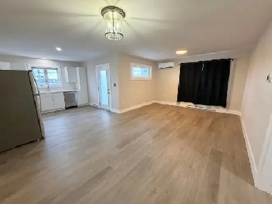 Brand new ground floor 1-bedroom apartment with walk-out balcony