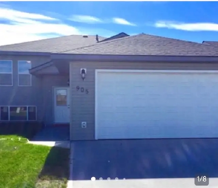 Beautiful 3 Bedroom Home with Double Garage & Large Fenced Yard