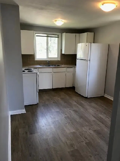 Clean, quiet 2 Br includes Utilities. Off St parking.