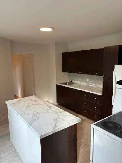 3 Bedroom  Den 7 1/2 ….HEATING INCLUDED