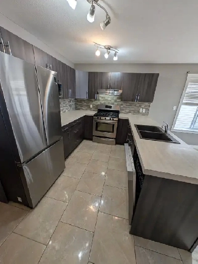 Upper duplex with single car garage and water included!