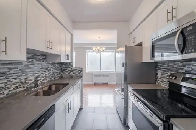 spacious 3-bed,2-bath condo for July 1, Westmount adj - ID 4458