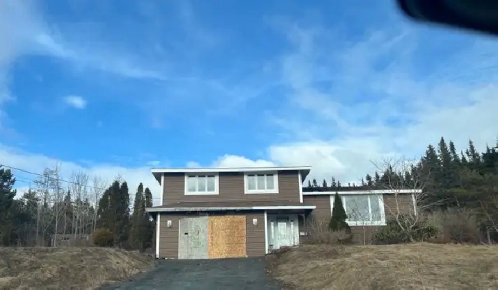 large split-level Home-Garage Fire Damage- Clean Shell