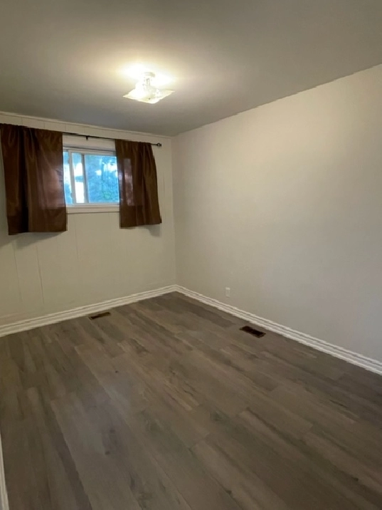Private room for rent on main floor midtown Aurora with parking