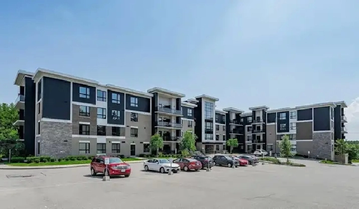 Spacious 3-Bedroom Condo with Balcony, Parking & Ensuite Laundry