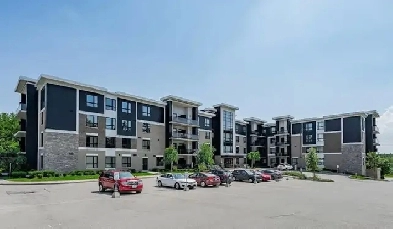 Spacious 3-Bedroom Condo with Balcony, Parking & Ensuite Laundry