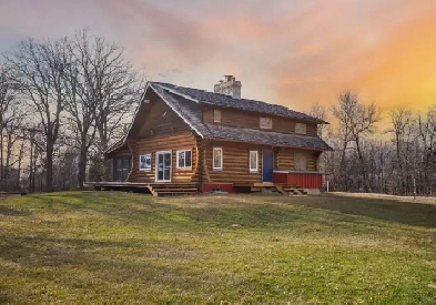 One-of-a-kind 1258sqft log home situated on beautiful 3.1 acres!