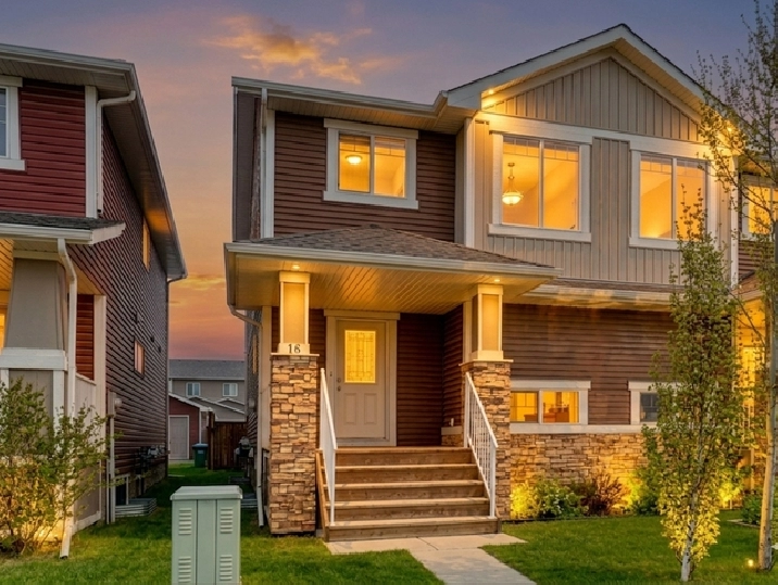 PRICE DROP! MODERN FULLY DEVELOPED COCHRANE HOME FOR SALE