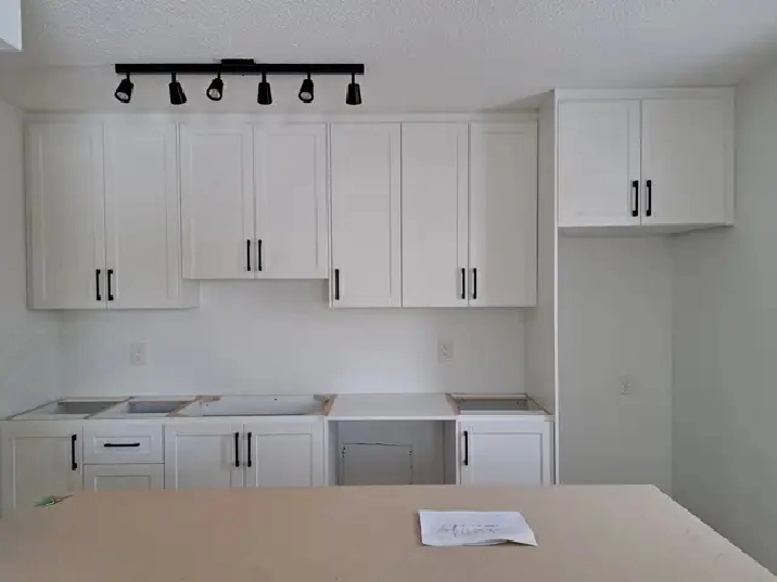 Renovated 2 bedroom   den in quiet West end building