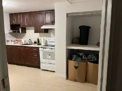 Basement suite with private bathroom and shared kitchen