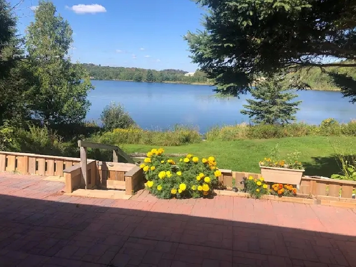 Lakefront Living: upgraded home w self contained basement unit